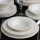 24-delig servies van crèmekleurig porselein
