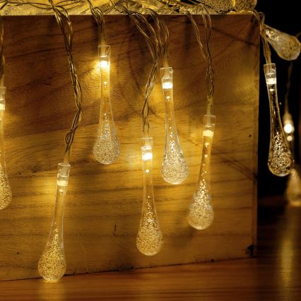 Aigostar - LED buiten kerstsnoer 100xLED/8 functies 3xAA 10 m IP44 warm wit druppels