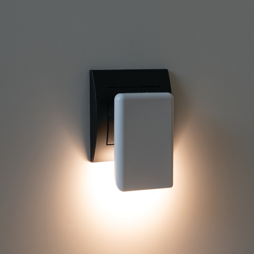 LED-oriëntatielamp met schemersensor voor in het stopcontact ORISA LED/0,28W/230V wit