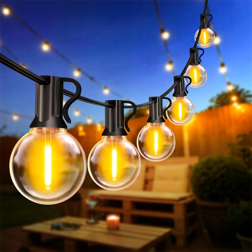 LED dimbare decoratieve lichtslinger voor buiten 25xE12/1W/24/230V 17,5 m IP65 zwart + afstandsbediening