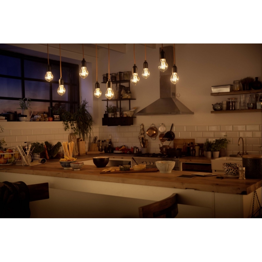 Philips Warm Glow  - LED Dimbare lamp E27 / 8W / 230V 2200K-2700K