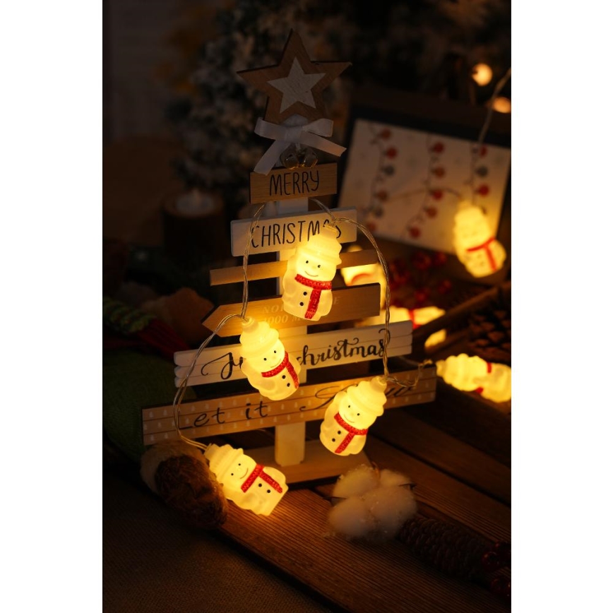 LED Kerst lichtsnoer 20xLED/3xAA/warm wit 3,3m Sneeuwpoppen