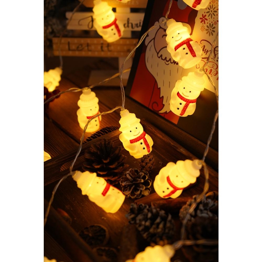 LED Kerst lichtsnoer 20xLED/3xAA/warm wit 3,3m Sneeuwpoppen