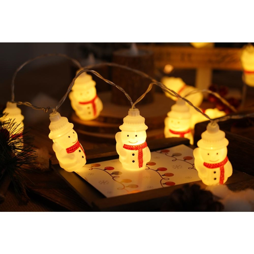 LED Kerst lichtsnoer 20xLED/3xAA/warm wit 3,3m Sneeuwpoppen