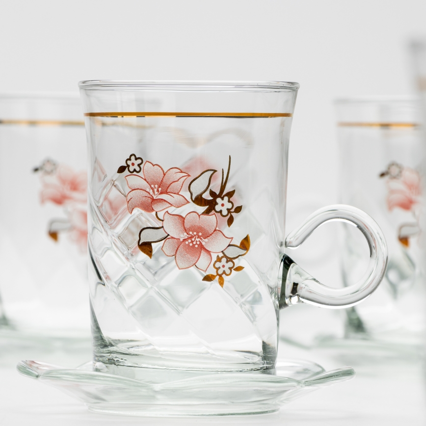 Set 6x glazen kop met schotel en 1x suiker kom doorzichtig boeket nr. 2