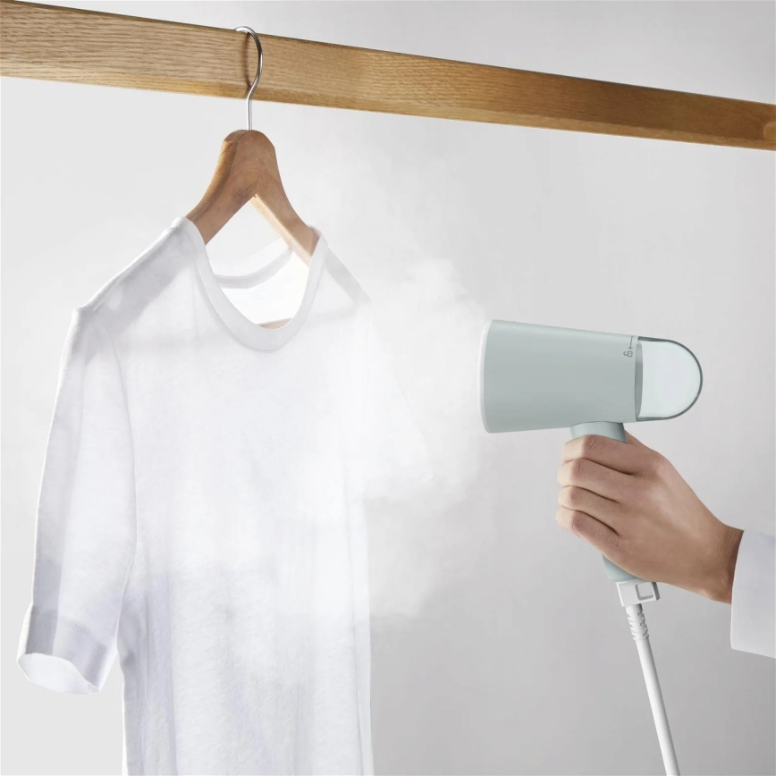 Tefal - Handbediende kledingstomer ORIGIN TRAVEL groen