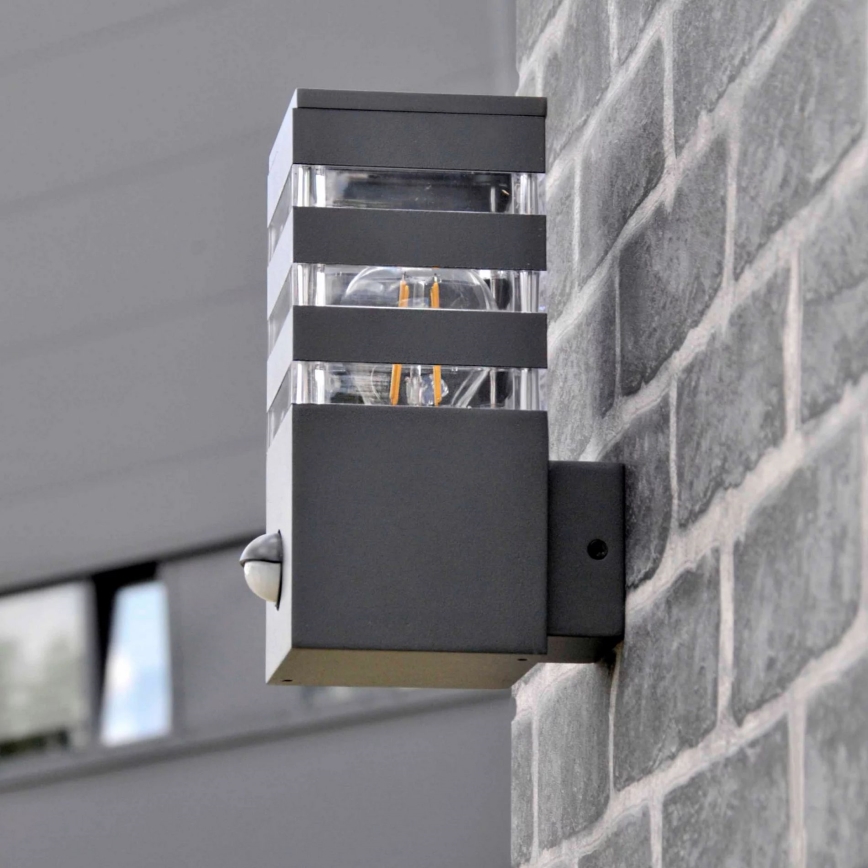 Wandlamp voor buiten met sensor TEKSAS 1xE27/12W/230V IP44 antraciet