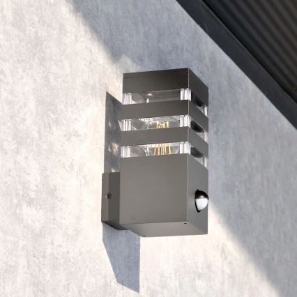 Wandlamp voor buiten met sensor TEKSAS 1xE27/12W/230V IP44 antraciet